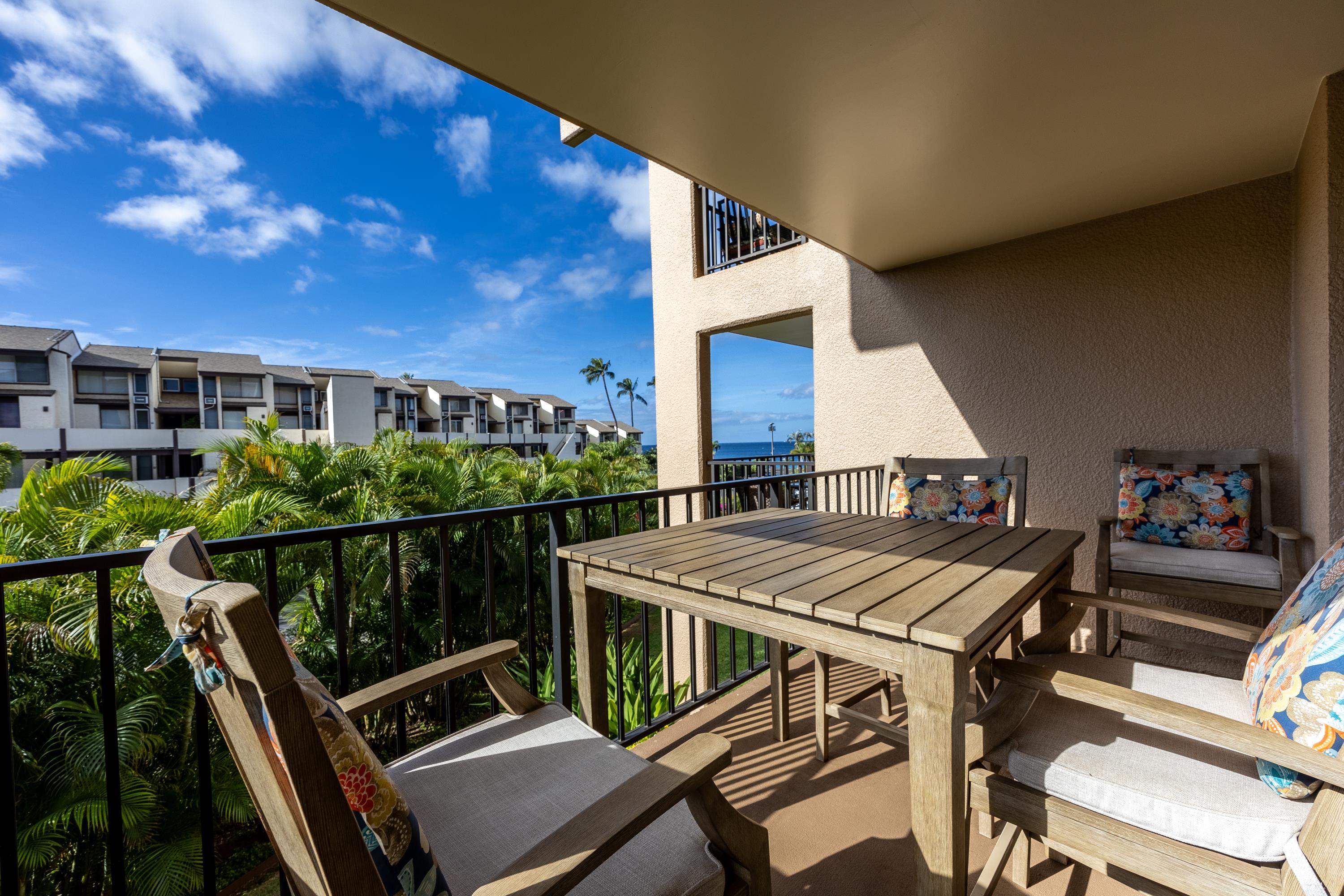 2695 South Kihei Road, Unit 9209 Kihei, HI 96753 - Photo 25 of 50 a view of roof deck with chairs and wooden floor
