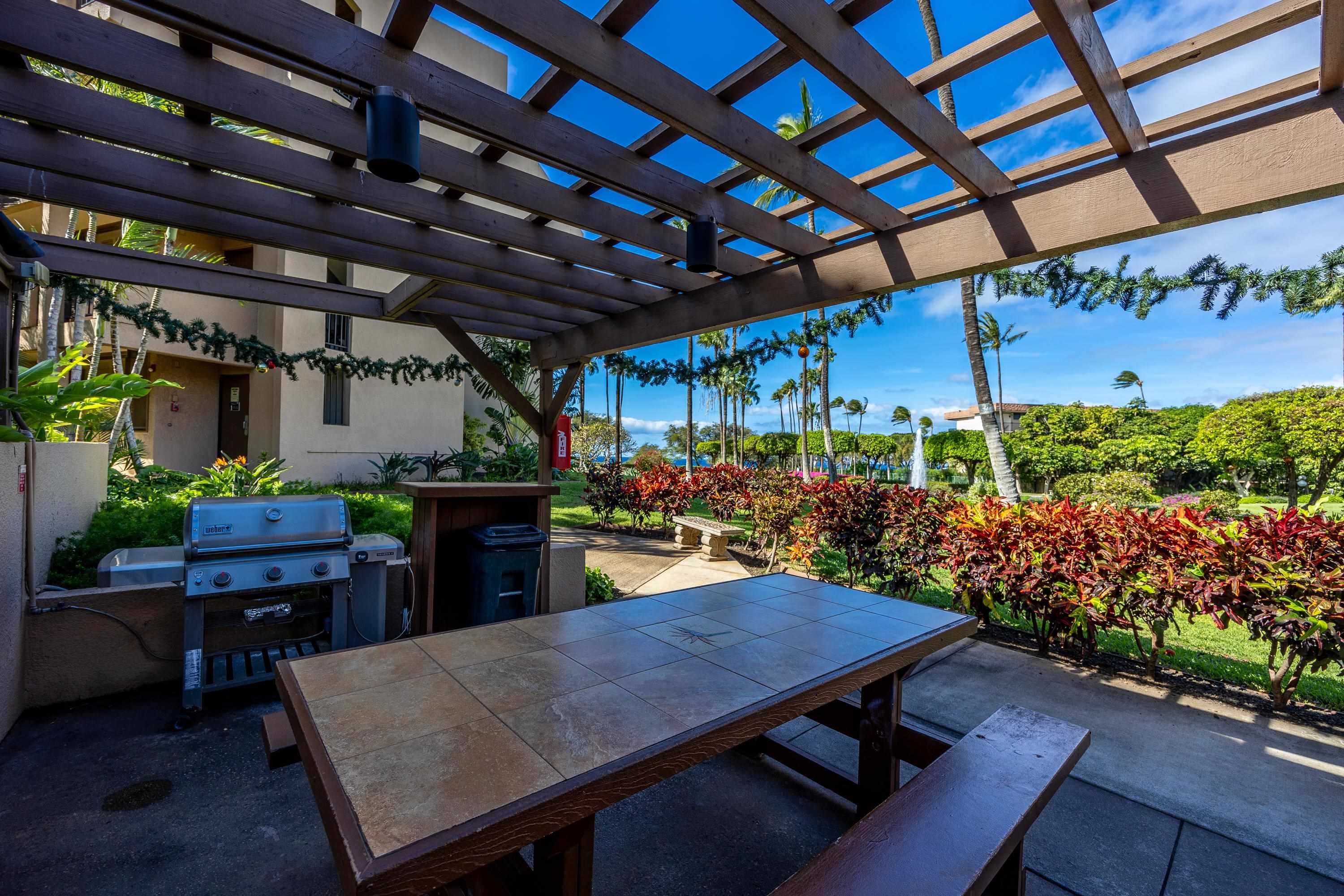 2695 South Kihei Road, Unit 9209 Kihei, HI 96753 - Photo 30 of 50 a view of a tables and chairs in patio