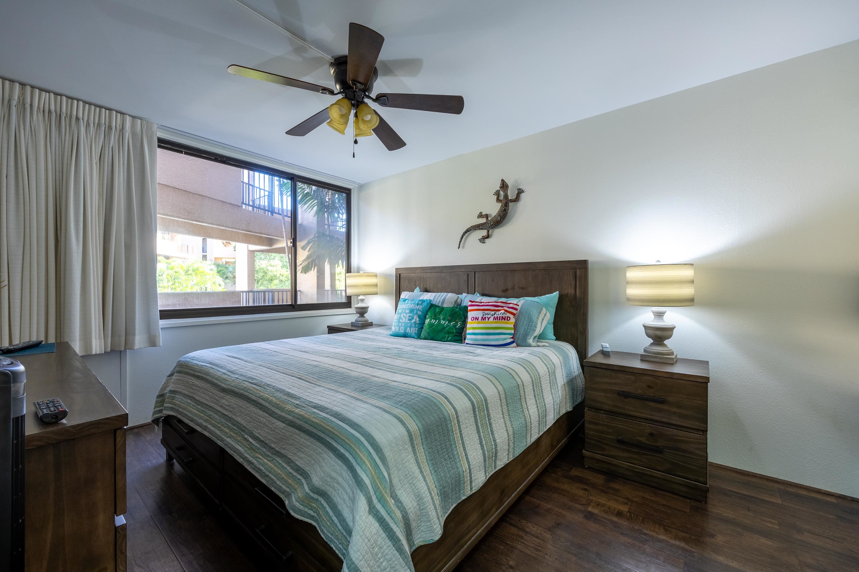 2695 South Kihei Road, Unit 9209 Kihei, HI 96753 - Photo 9 of 50 a bedroom with a bed and a window