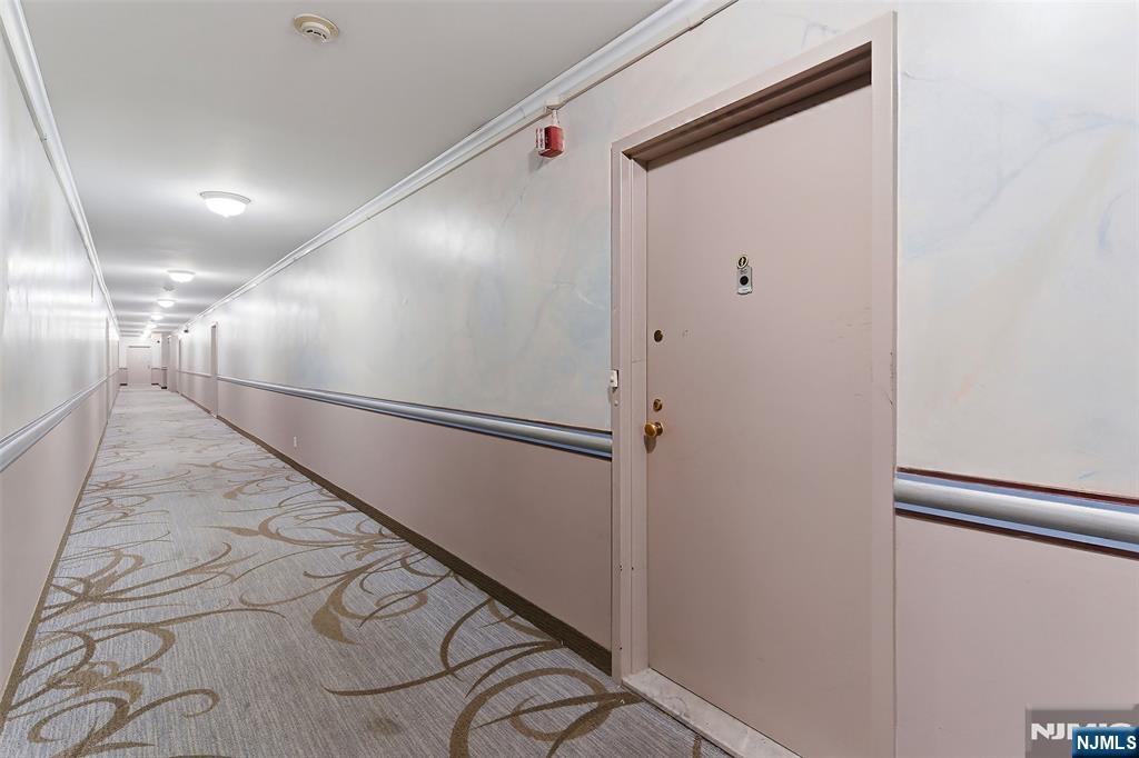 280 Prospect Avenue, Unit 8G Hackensack, NJ 07601 - Photo 6 of 23 a view of a hallway