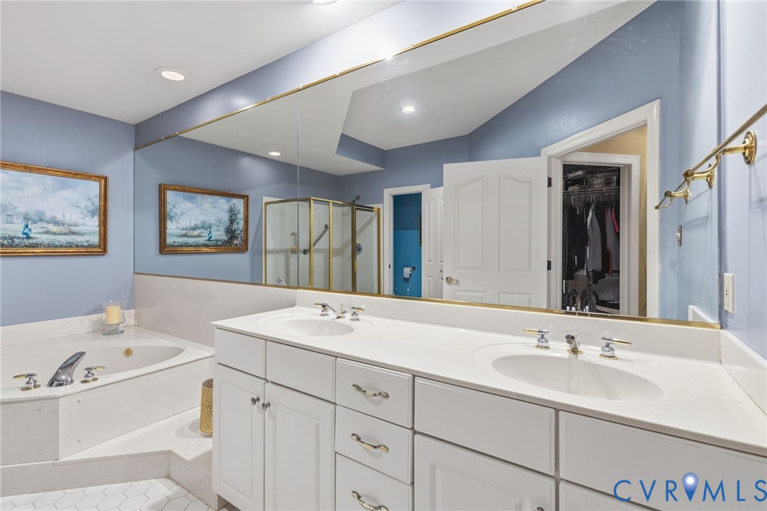 3137 Stony Point Road, Unit D Richmond, VA 23235 - Photo 25 of 31 Primary bath with double vanity and jetted tub.