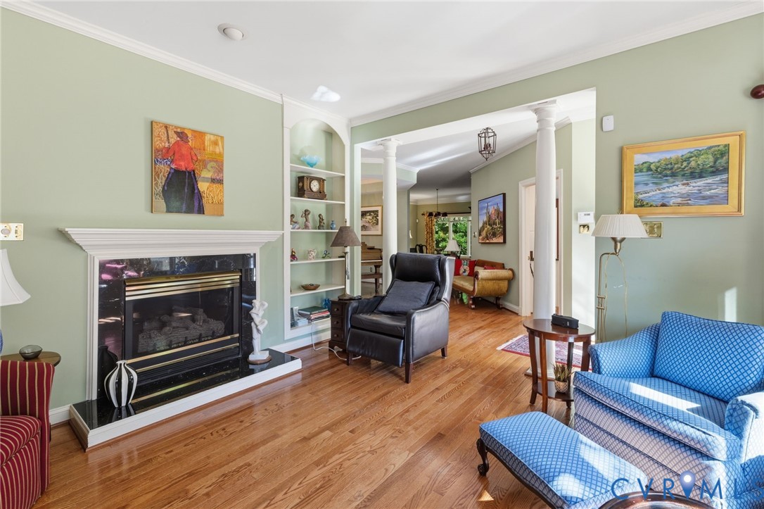 3137 Stony Point Road, Unit D Richmond, VA 23235 - Photo 6 of 31 The living room has arched alcove bookcase, column