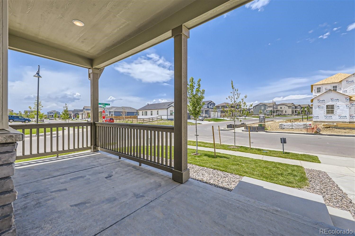 12864 Pinnacle Firestone, CO 80504 - Photo 17 of 29 a view of a porch with a yard
