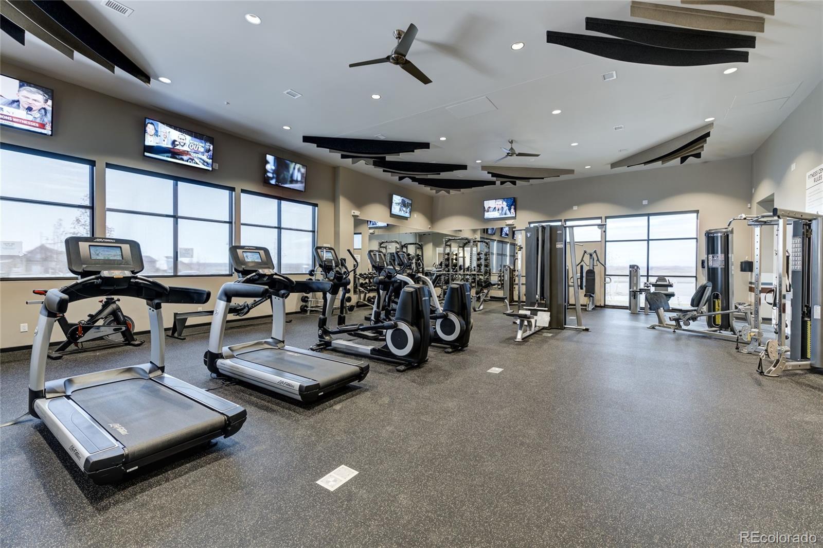 12864 Pinnacle Firestone, CO 80504 - Photo 21 of 29 a view of a room with gym equipment