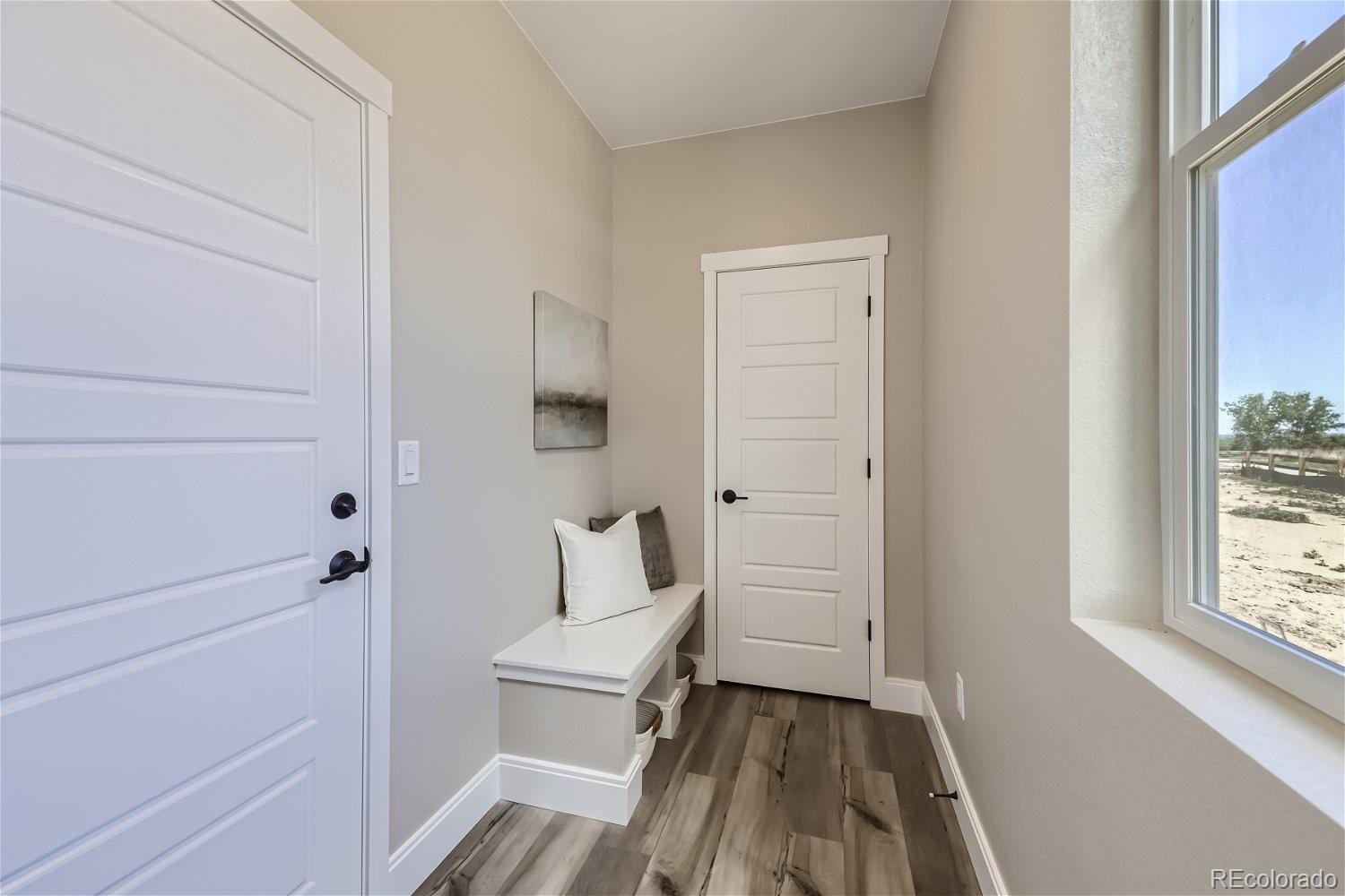 12864 Pinnacle Firestone, CO 80504 - Photo 9 of 29 a bathroom with a sink and a toilet