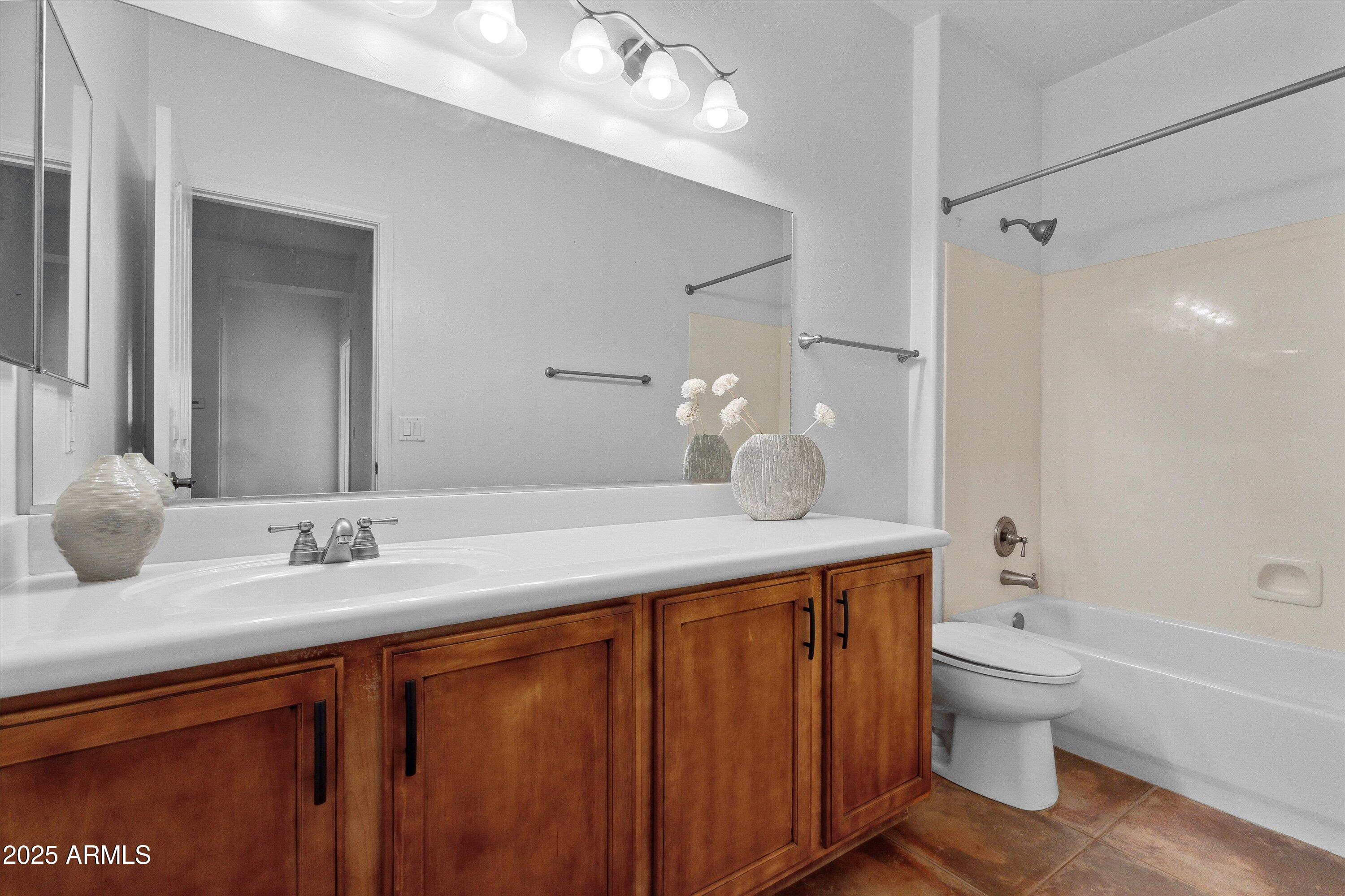 17407 South Purple Mesa Trail Vail, AZ 85641 - Photo 35 of 54 a bathroom with a granite countertop sink toilet and shower