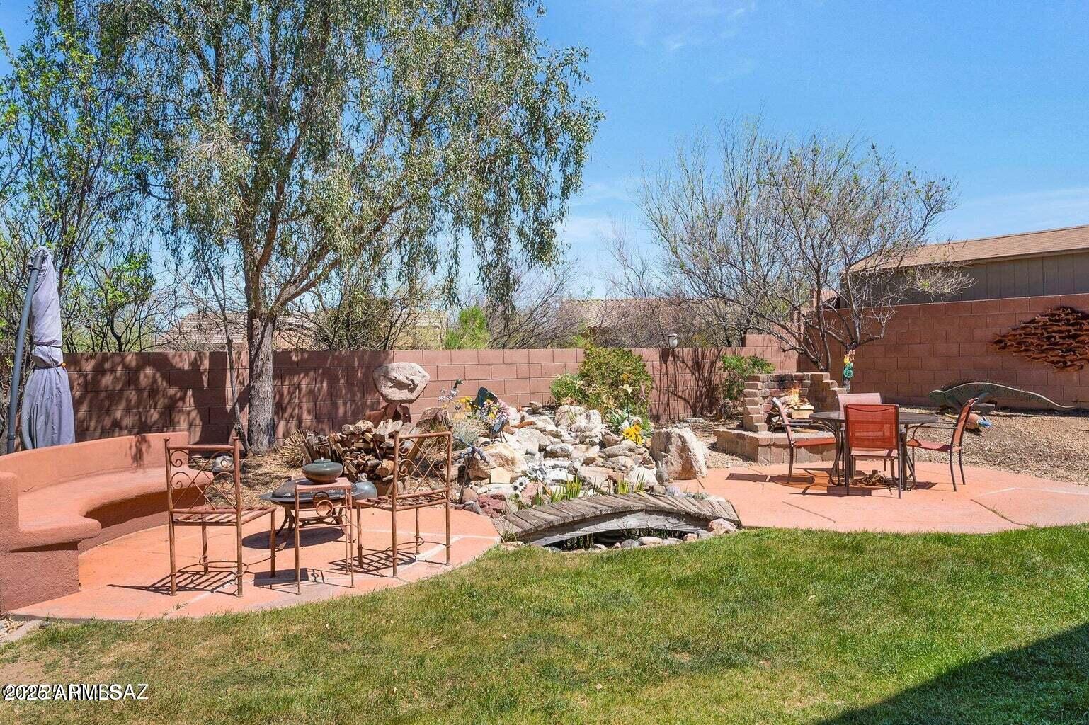 17407 South Purple Mesa Trail Vail, AZ 85641 - Photo 43 of 54 a view of a backyard with a patio