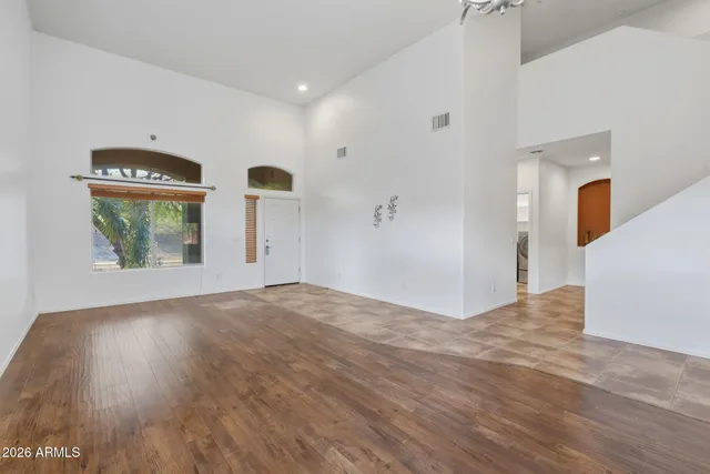 a kitchen with stainless steel appliances a stove a sink and a microwave
