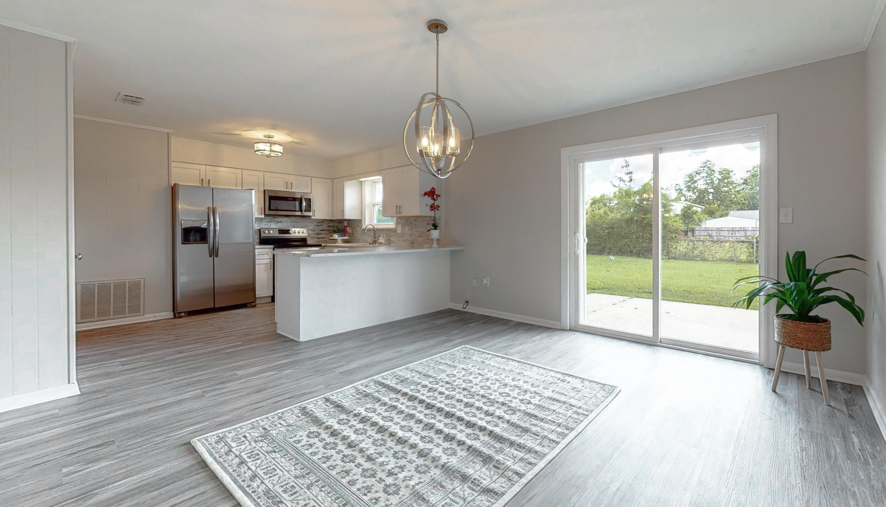 321 Echo Circle Fort Walton Beach, FL 32548 - Photo 3 of 35 a view of a kitchen with a stove