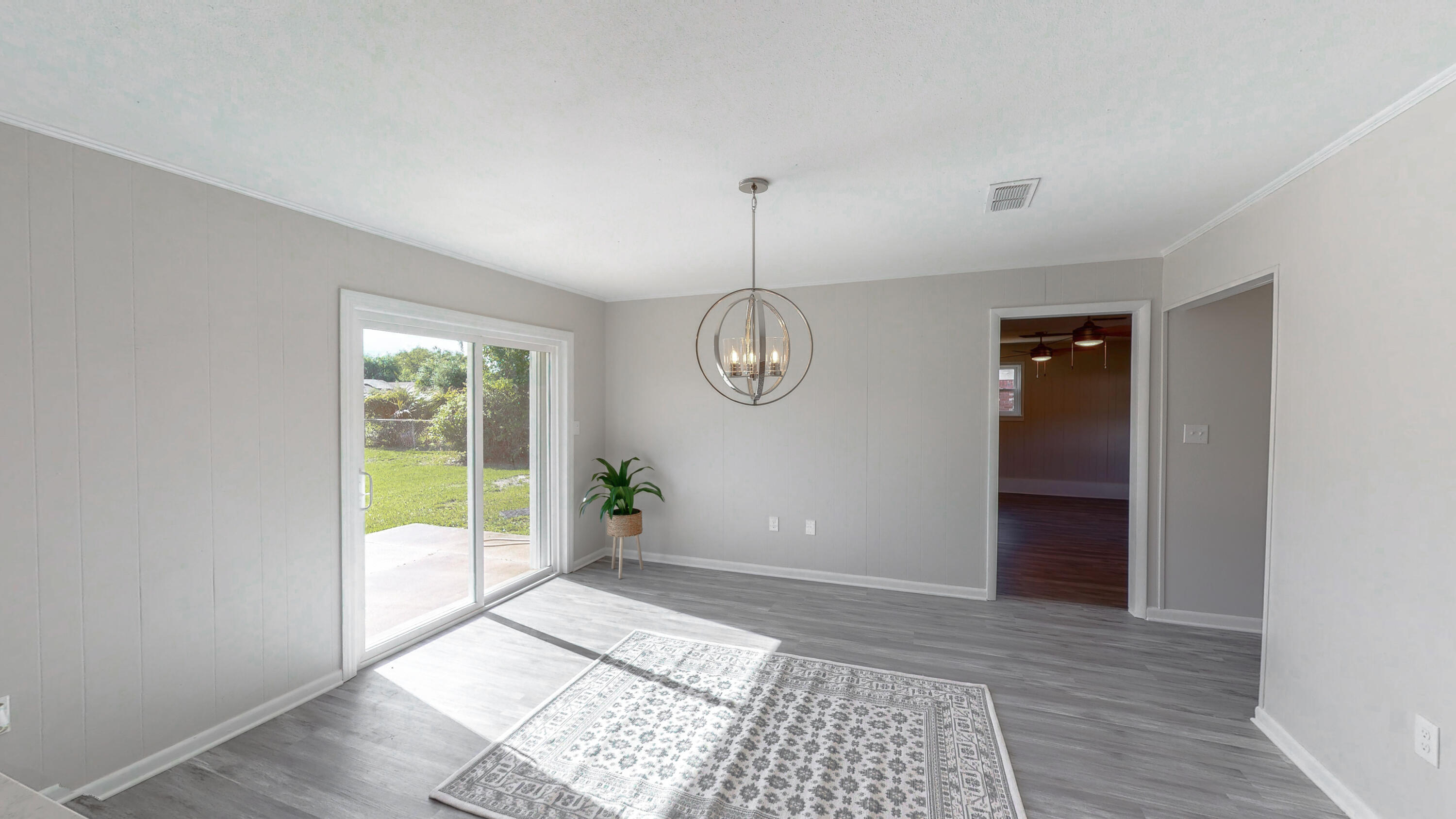 321 Echo Circle Fort Walton Beach, FL 32548 - Photo 22 of 35 a view of an empty room with glass door