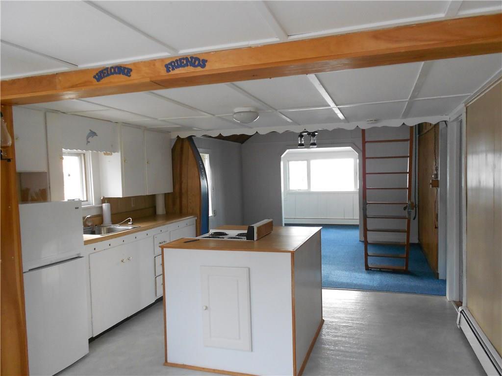 24 Basin Cove Road Harpswell, ME 04079 - Photo 12 of 28 Kitchen looking to living room and water