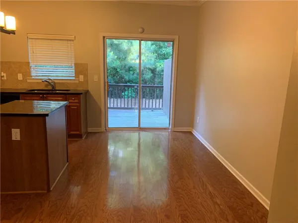 a view of a kitchen with a sink