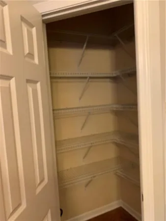 a bathroom with a glass door