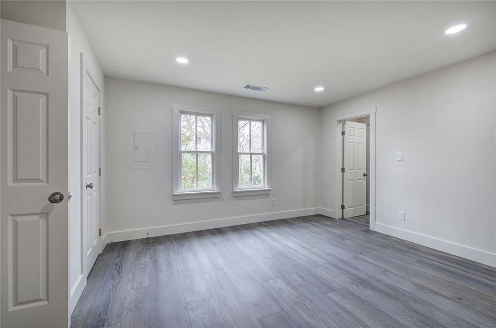30 Grove Circle Cartersville, GA 30120 - Photo 15 of 33 a view of an empty room with wooden floor and a window