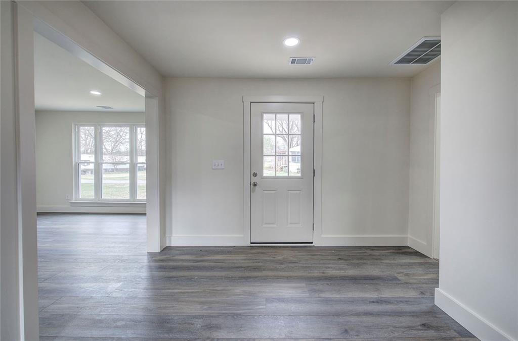 30 Grove Circle Cartersville, GA 30120 - Photo 21 of 33 an empty room with wooden floor and windows