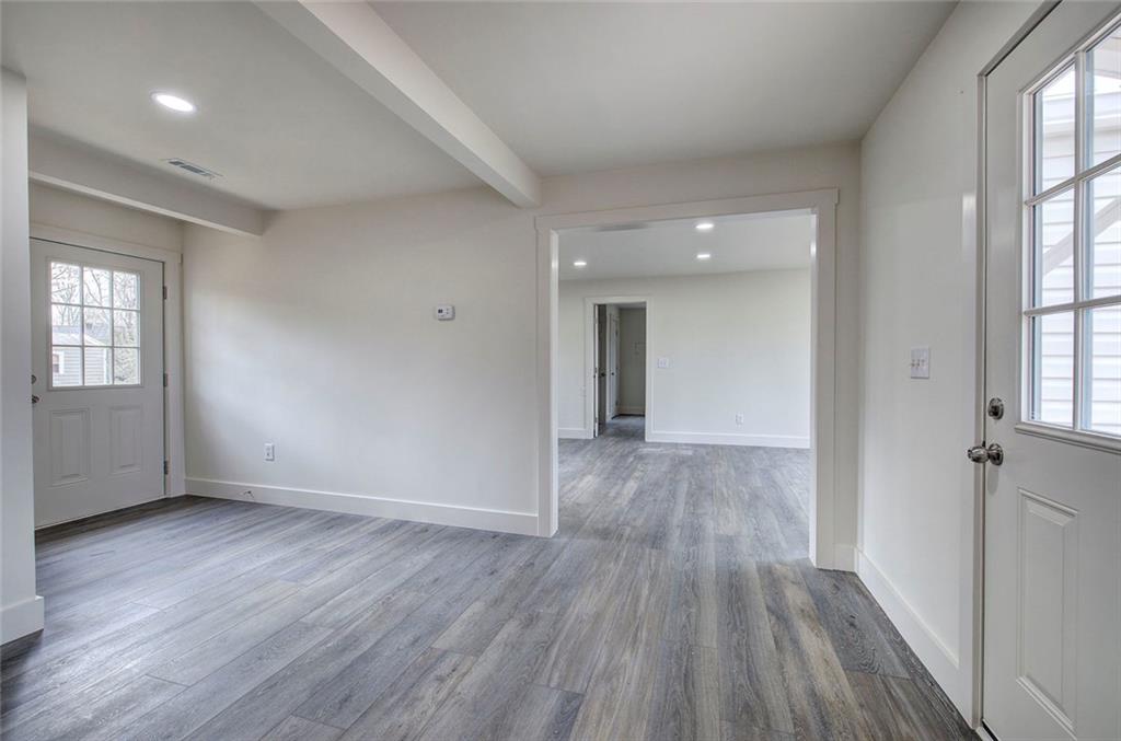 30 Grove Circle Cartersville, GA 30120 - Photo 22 of 33 wooden floor in an empty room with a window