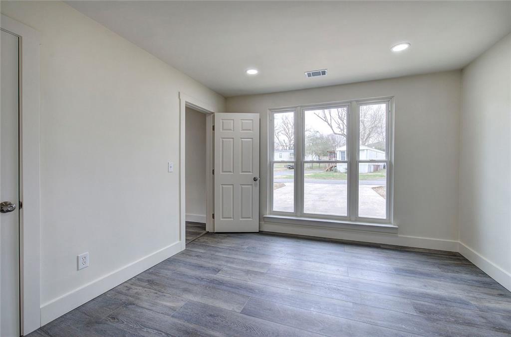 30 Grove Circle Cartersville, GA 30120 - Photo 24 of 33 an empty room with wooden floor and windows