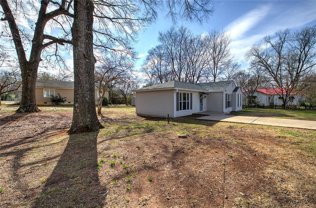 30 Grove Circle Cartersville, GA 30120 - Photo 4 of 33 a view of a house with a yard