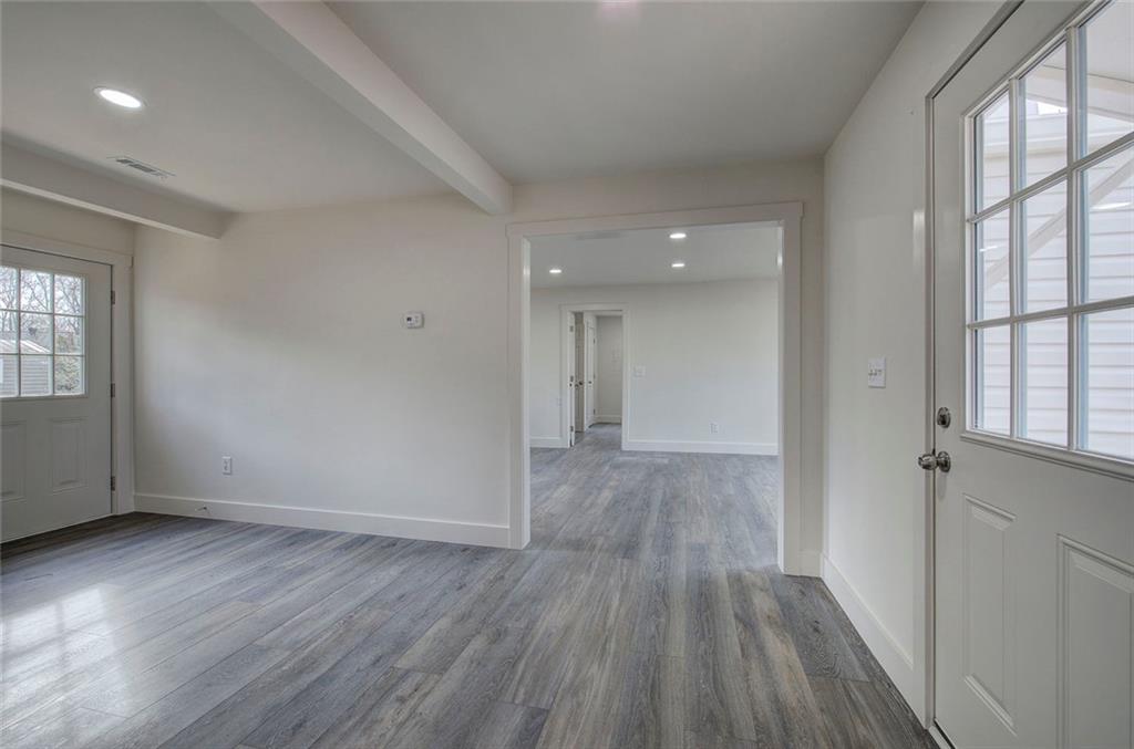 30 Grove Circle Cartersville, GA 30120 - Photo 5 of 33 wooden floor in an empty room with a window