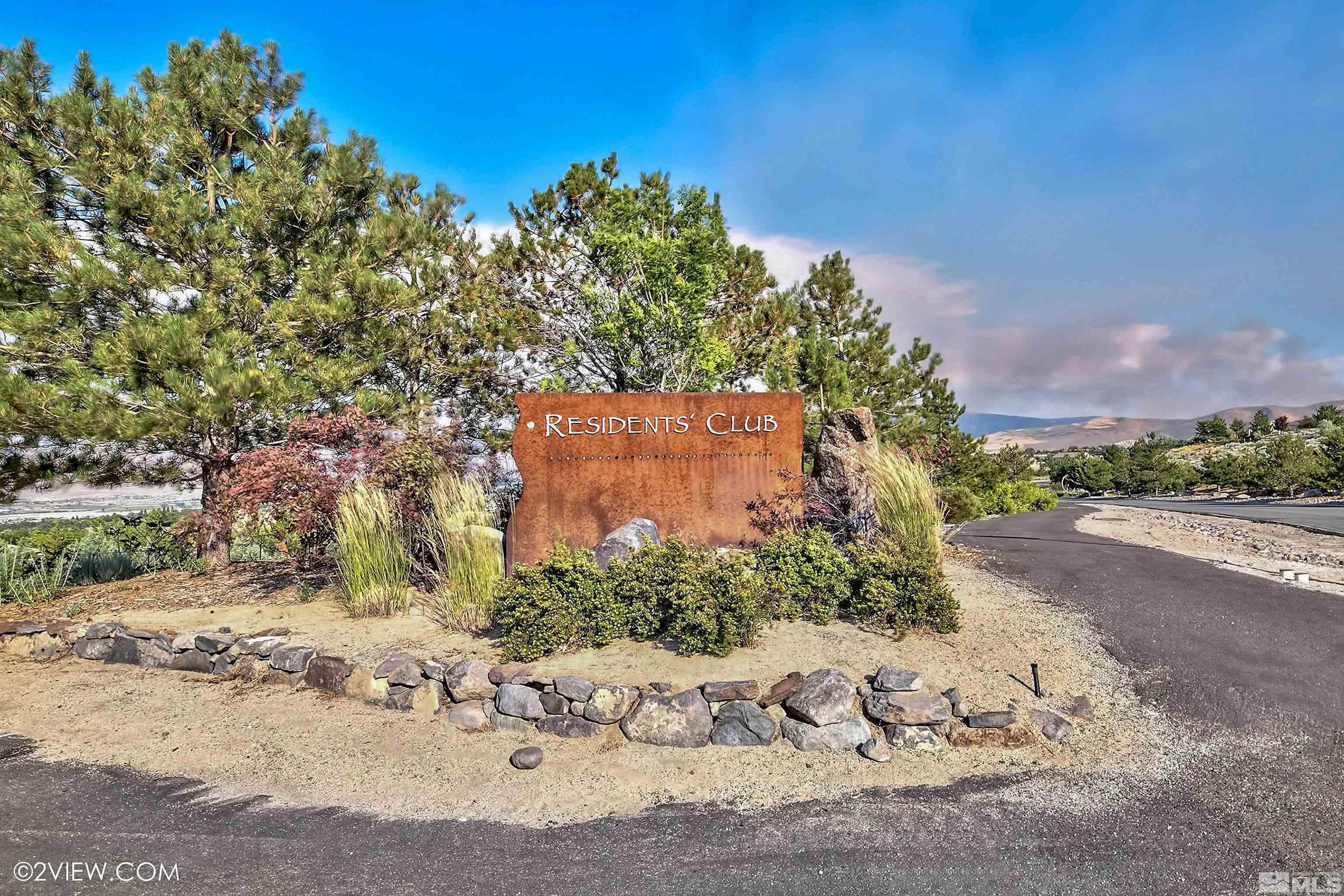 4110 Spotted Eagle Court Reno, NV 89511 - Photo 31 of 40 a view of a dry yard with large trees