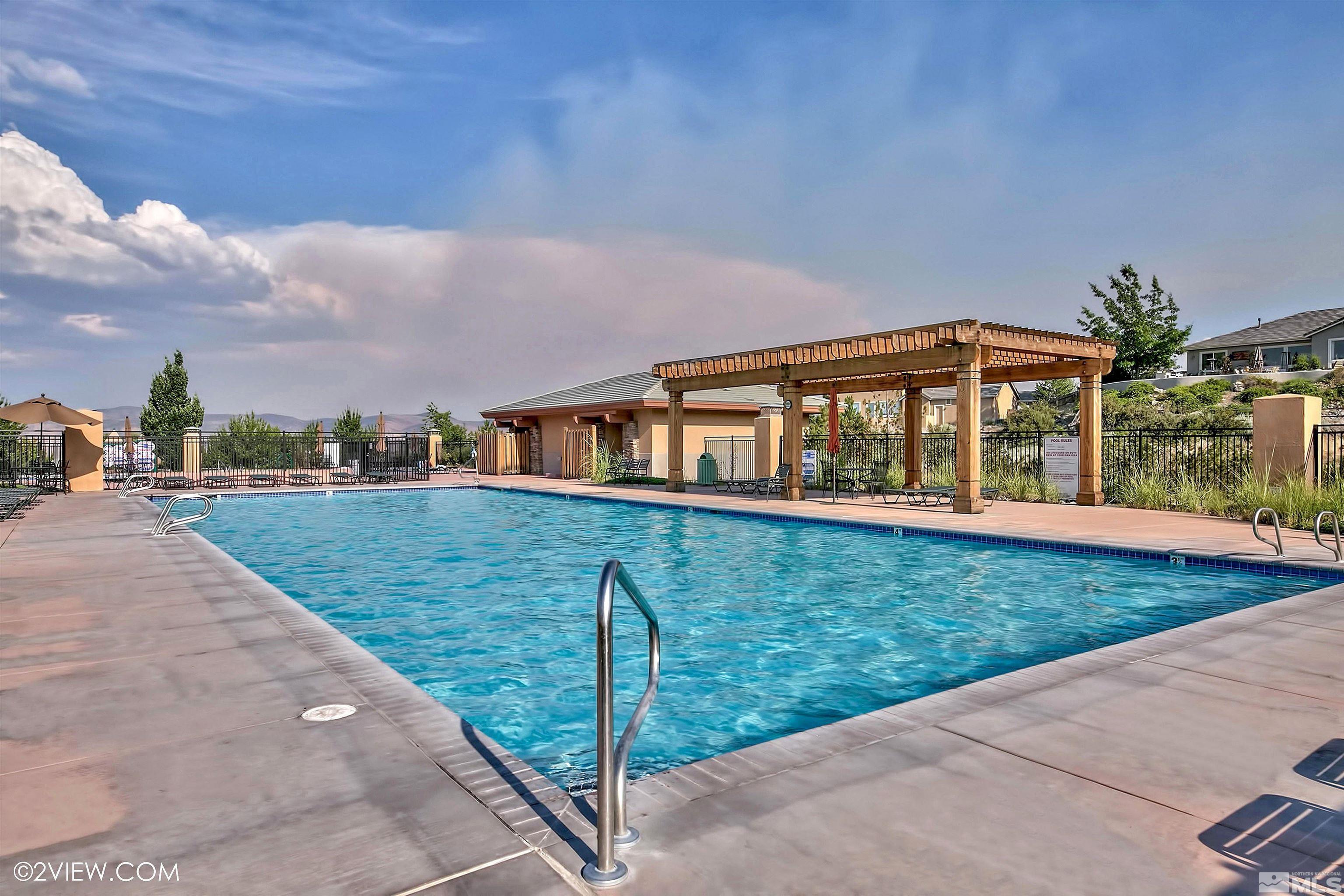 4110 Spotted Eagle Court Reno, NV 89511 - Photo 33 of 40 a front view of a house with a yard