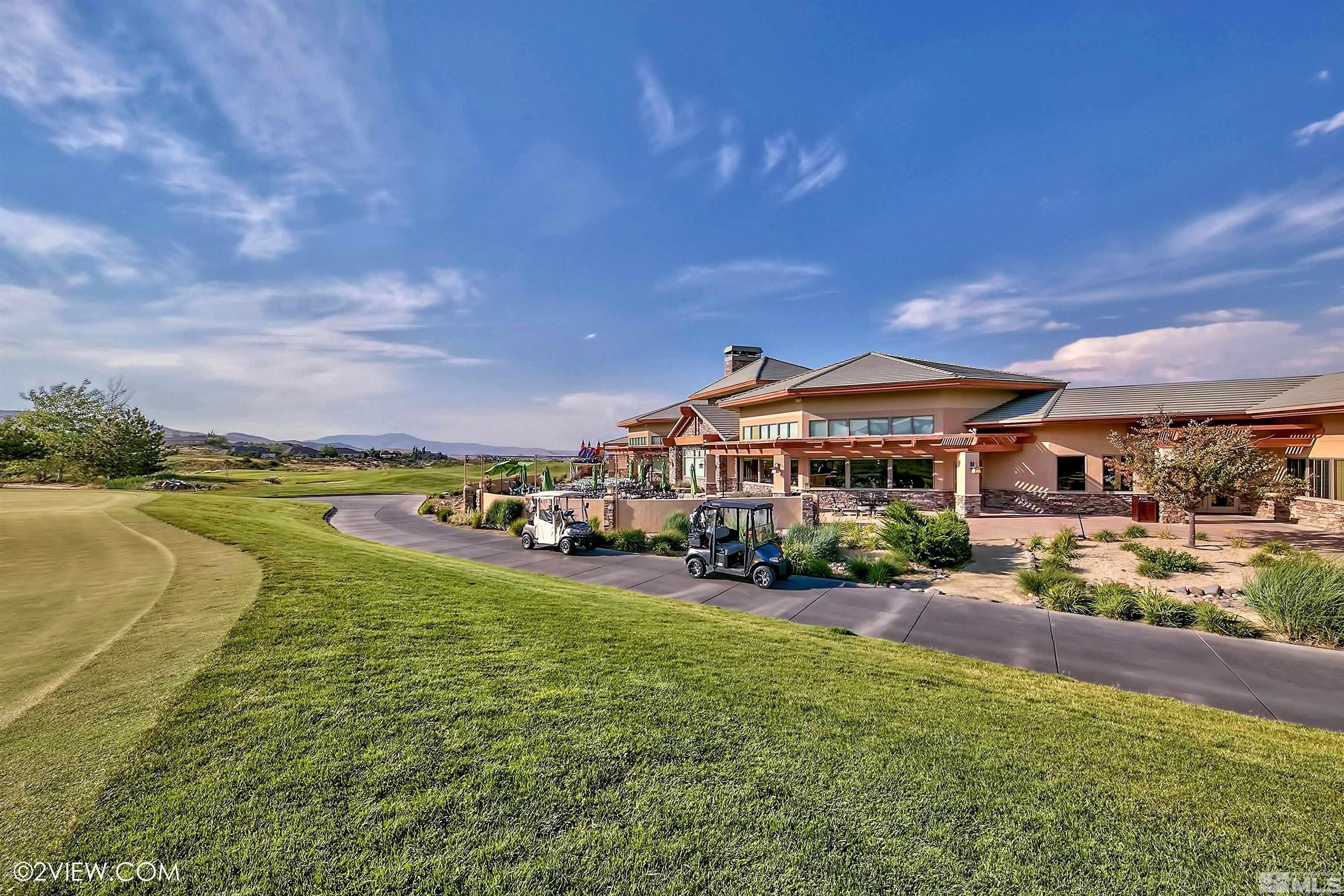 4110 Spotted Eagle Court Reno, NV 89511 - Photo 38 of 40 a view of a house with swimming pool and a yard