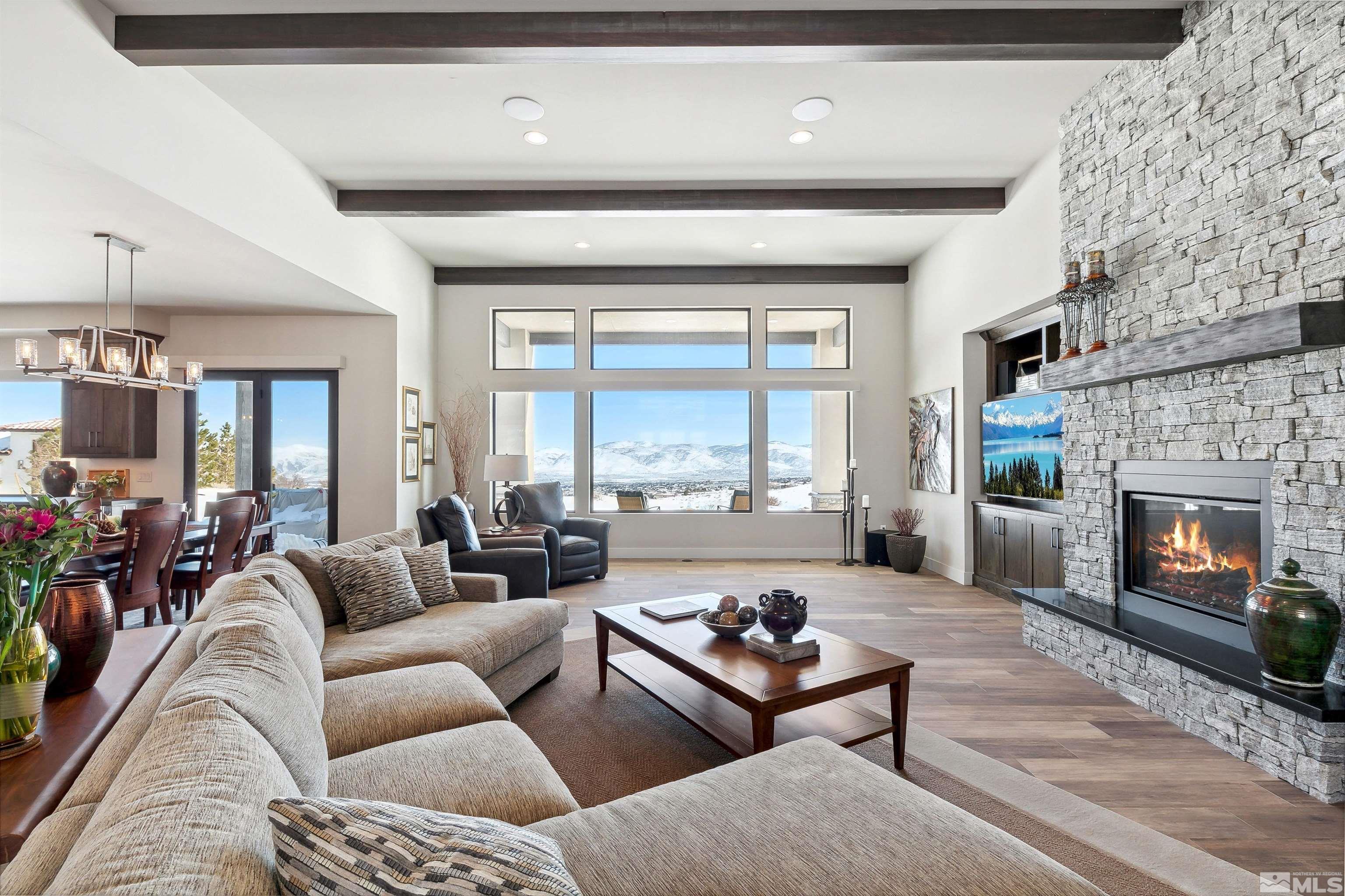 4110 Spotted Eagle Court Reno, NV 89511 - Photo 6 of 40 a living room with furniture and a fireplace