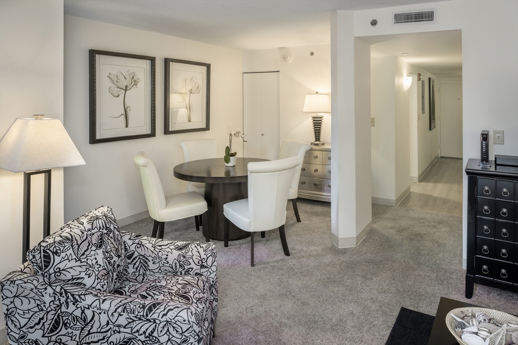 150 Huntington Avenue, Unit SJ3 Boston, MA 02115 - Photo 11 of 11 a view of a livingroom with furniture and a table