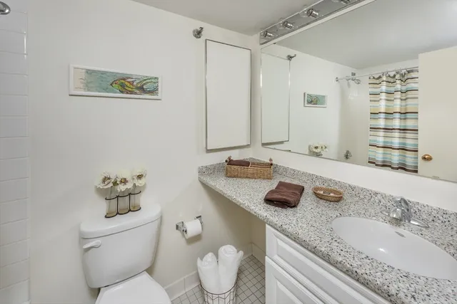 a view of a livingroom with furniture and a table