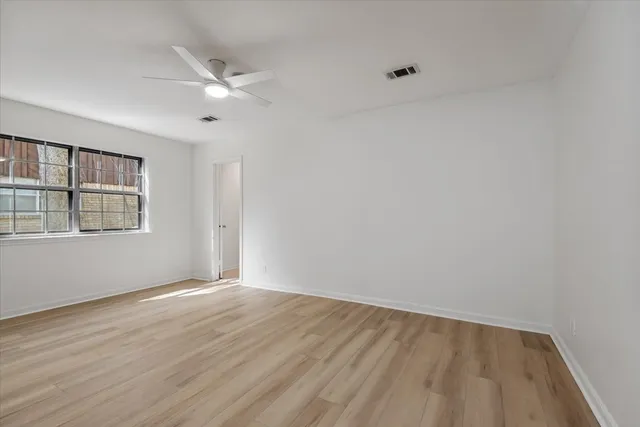 a view of a house with backyard and garden