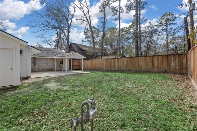 $330,000 | 20 Woody Creek Drive, Conroe, TX 77301