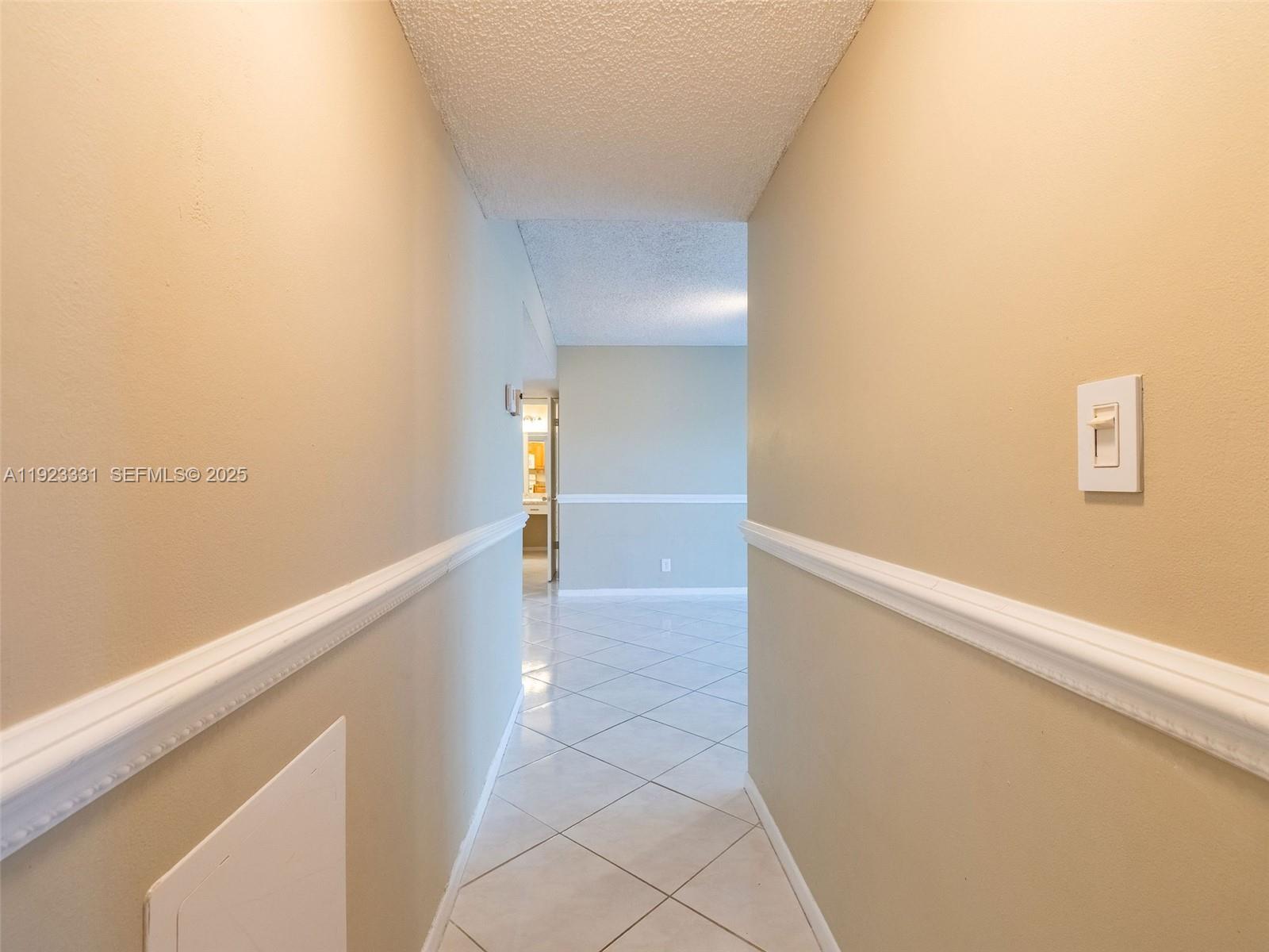 6600 Cypress Road, Unit 406 Plantation, FL 33317 - Photo 11 of 28 a view of a hallway