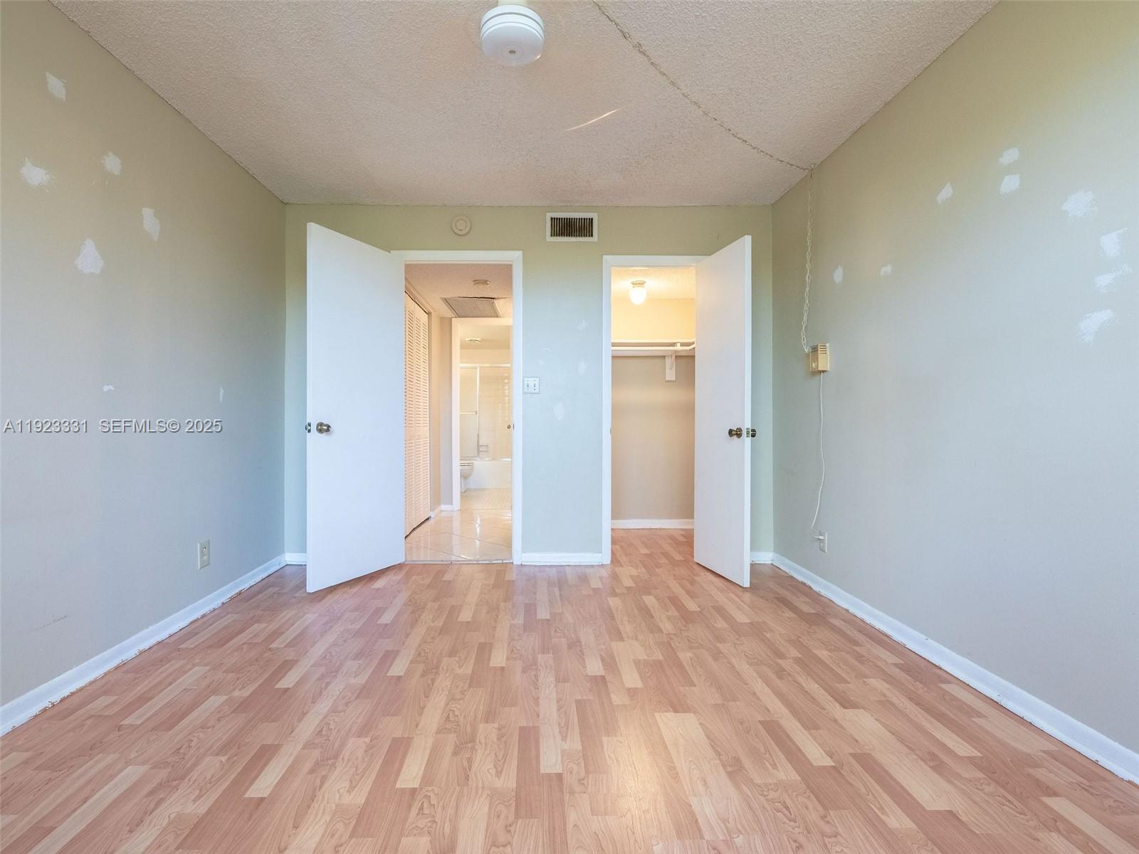 6600 Cypress Road, Unit 406 Plantation, FL 33317 - Photo 15 of 28 a view of empty room with wooden floor