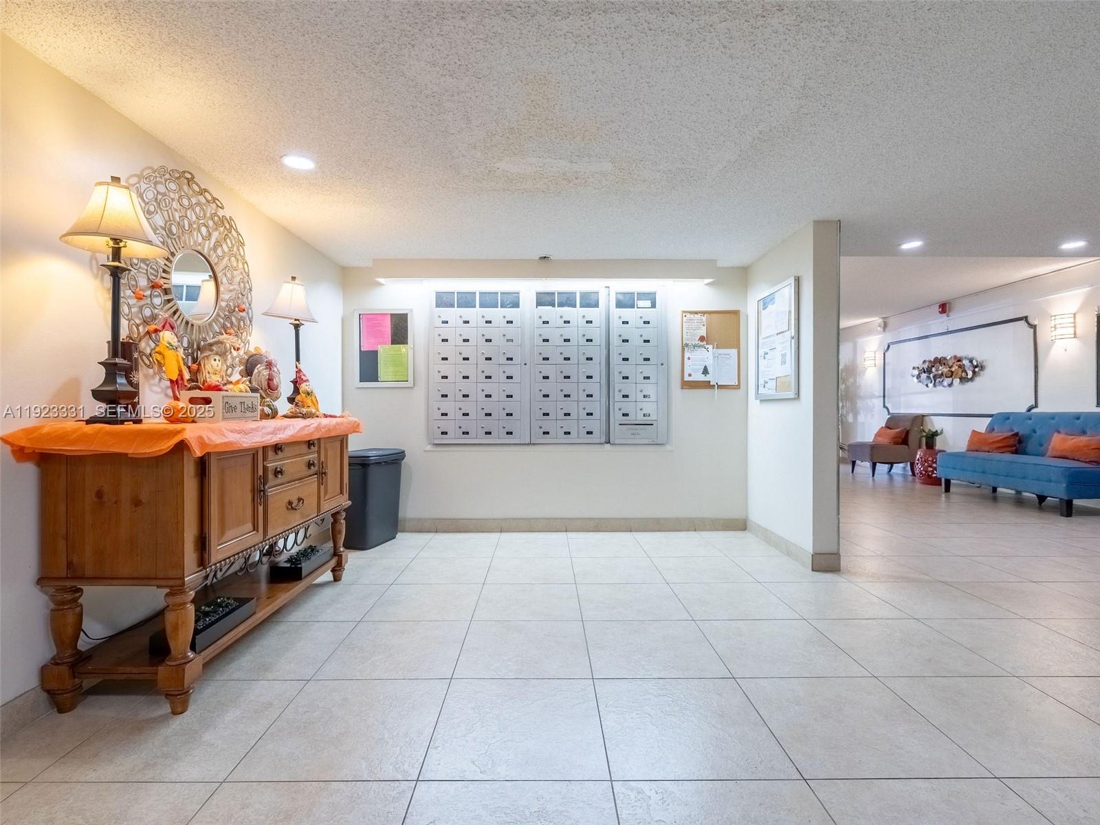 6600 Cypress Road, Unit 406 Plantation, FL 33317 - Photo 20 of 28 a bedroom with furniture and a large window
