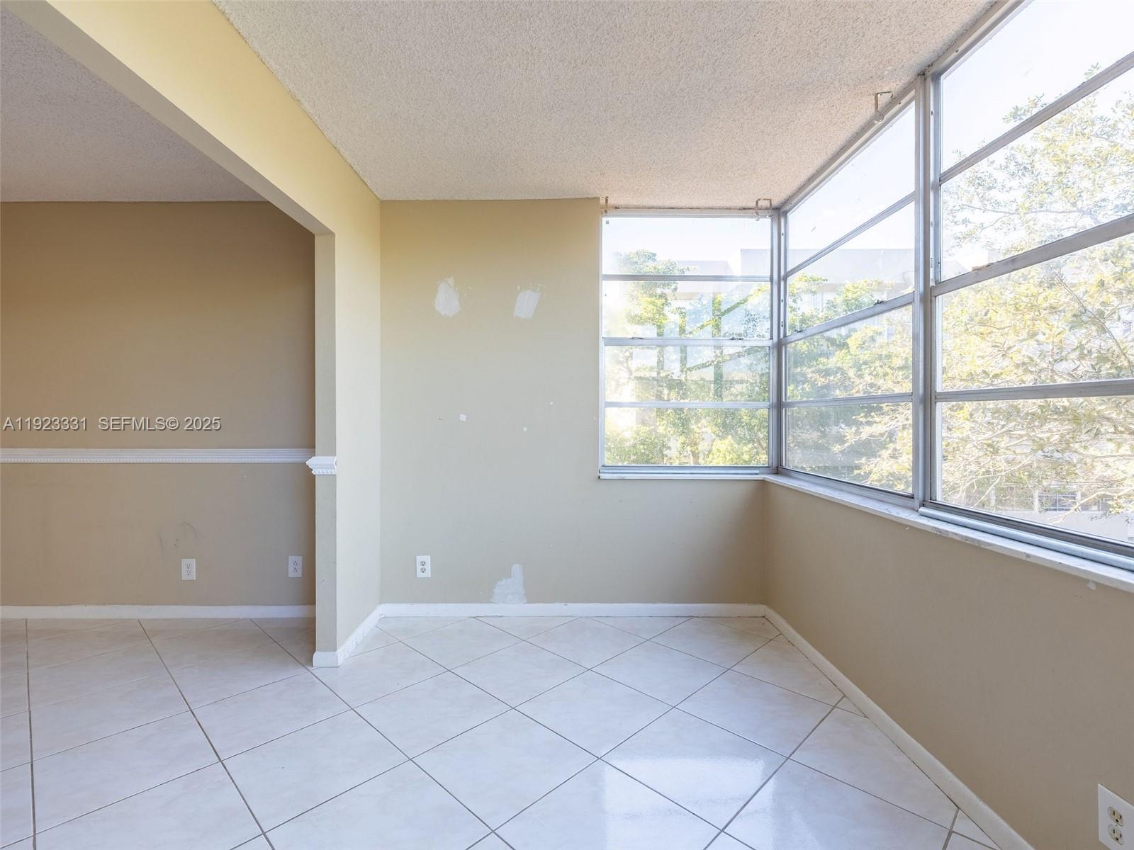 6600 Cypress Road, Unit 406 Plantation, FL 33317 - Photo 9 of 28 a view of room with window