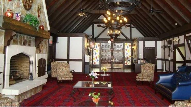 3750 Inverrary Drive, Unit 2K Lauderhill, FL 33319 - Photo 5 of 13 a living room with furniture and a fireplace