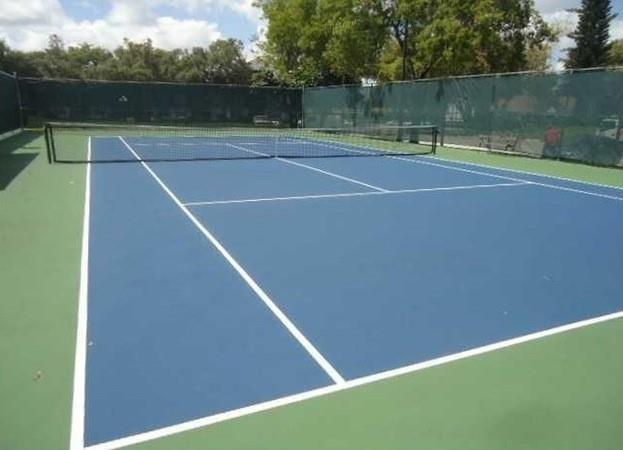3750 Inverrary Drive, Unit 2K Lauderhill, FL 33319 - Photo 6 of 13 a view of a tennis court
