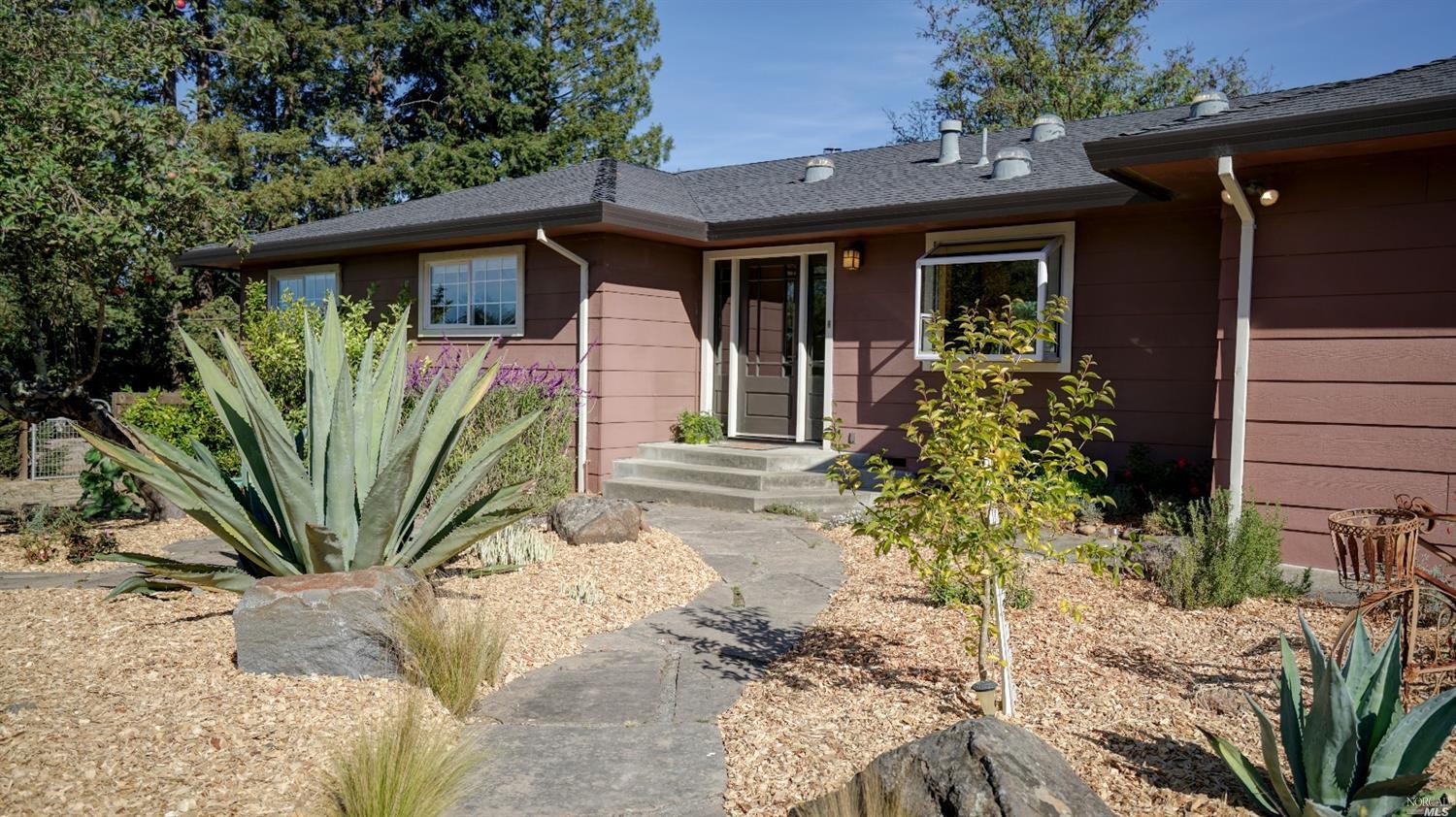 1692 Bloomfield Road Sebastopol, CA 95472 - Photo 1 of 1 a view of a house with potted plants