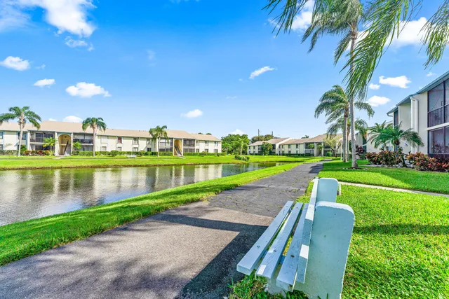 a view of a lake with a big yard