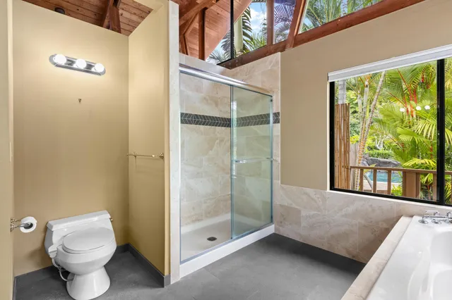 a bathroom with a toilet sink and tub