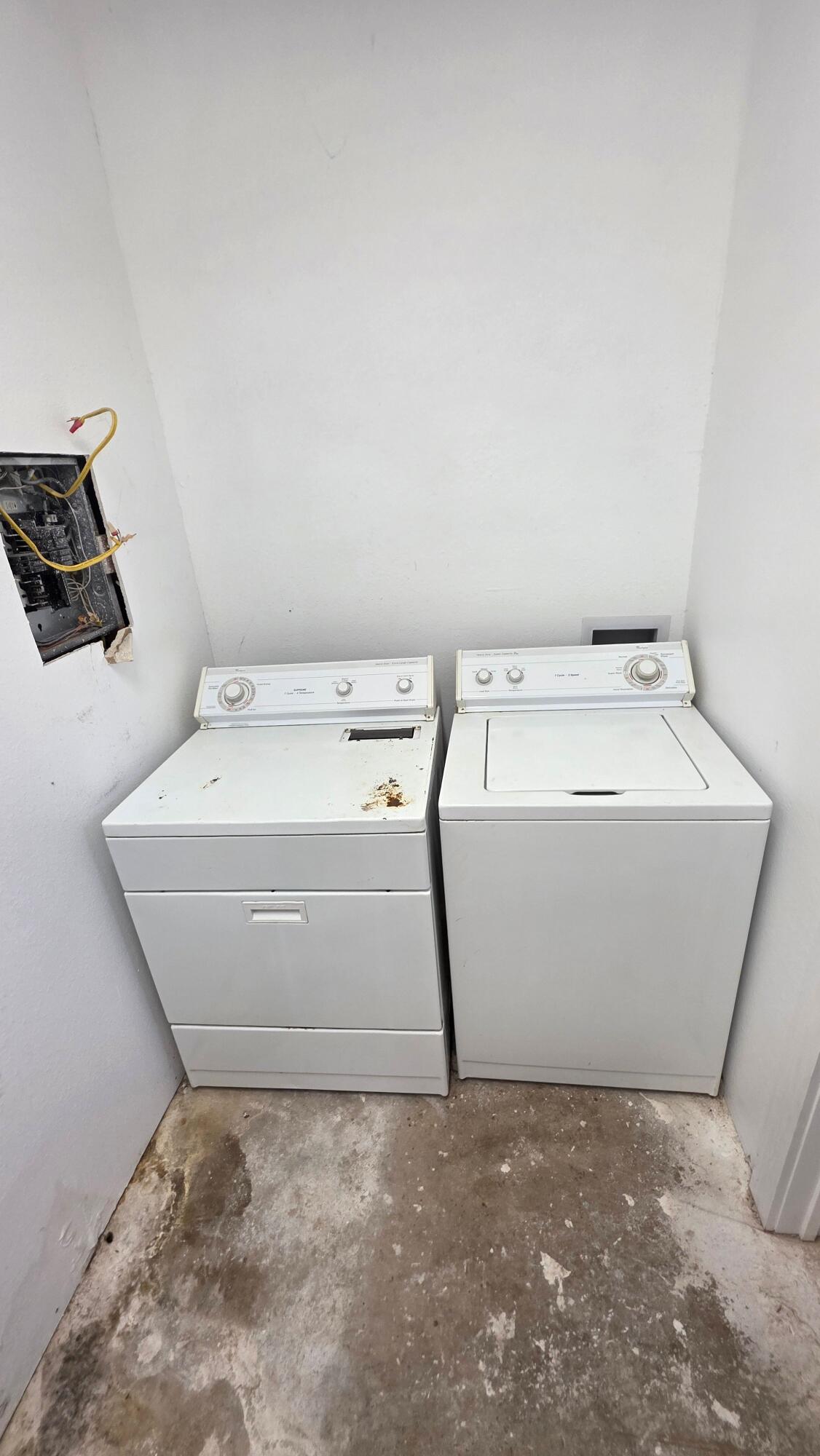 2403 38th Street Lubbock, TX 79412 - Photo 14 of 17 a utility room with dryer and washer