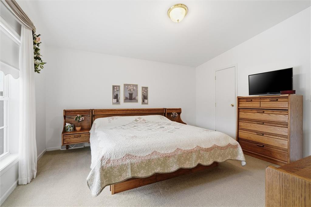 2001 Pond Lane Elizabeth, PA 15037 - Photo 19 of 38 a bedroom with a bed and a flat screen tv