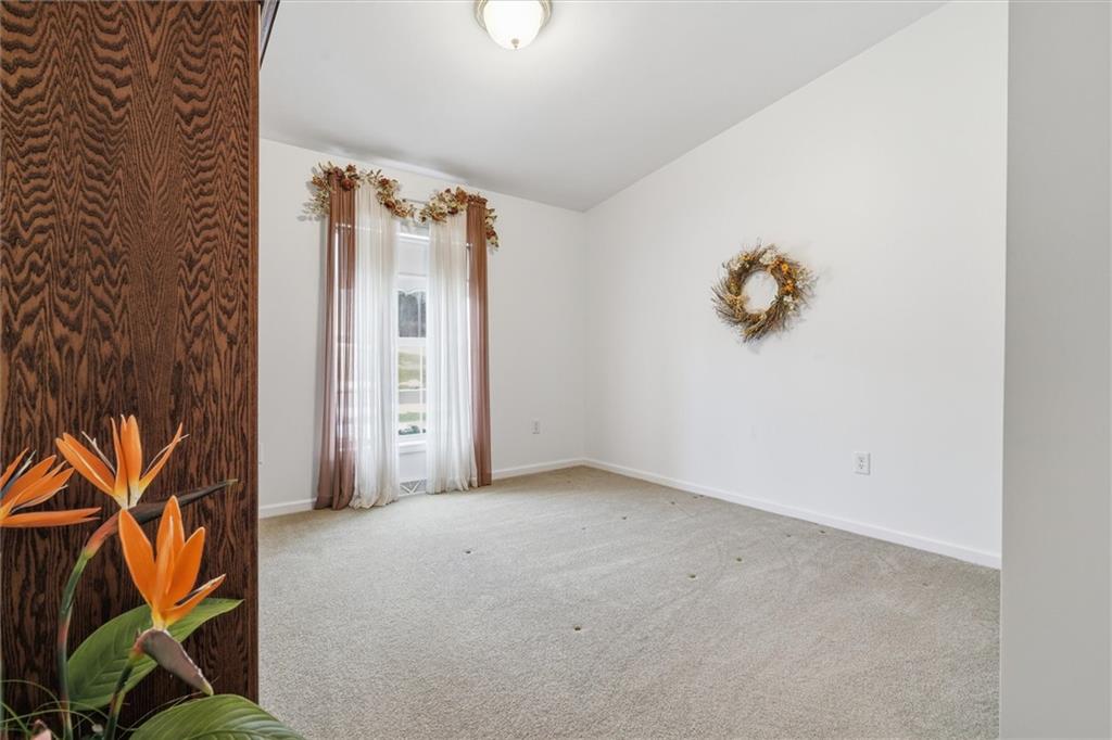 2001 Pond Lane Elizabeth, PA 15037 - Photo 24 of 38 an empty room with a painting on the wall