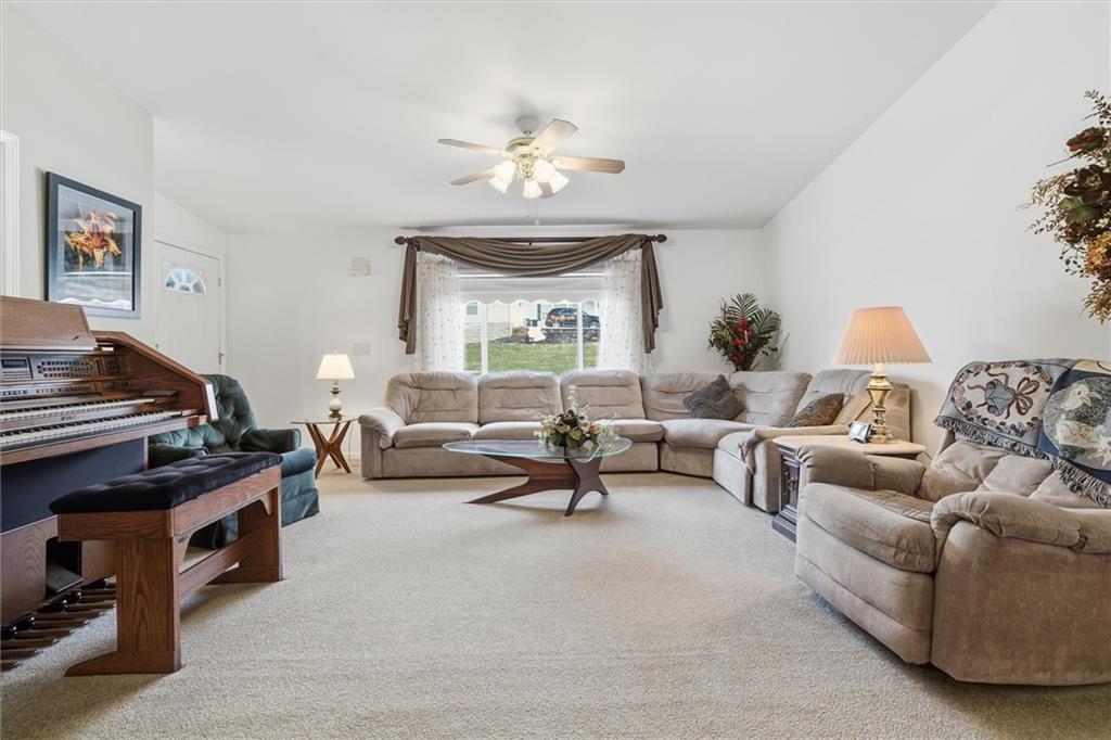 2001 Pond Lane Elizabeth, PA 15037 - Photo 6 of 38 a living room with furniture and a chandelier