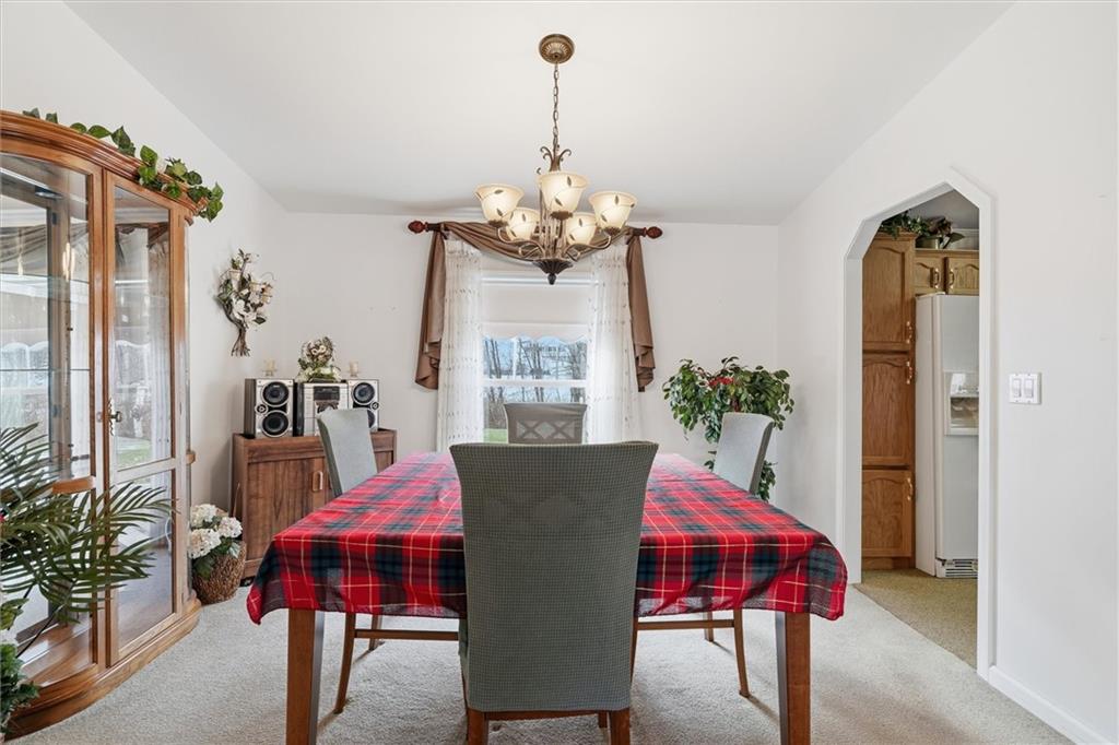 2001 Pond Lane Elizabeth, PA 15037 - Photo 8 of 38 a view of a dining room with furniture and chandelier