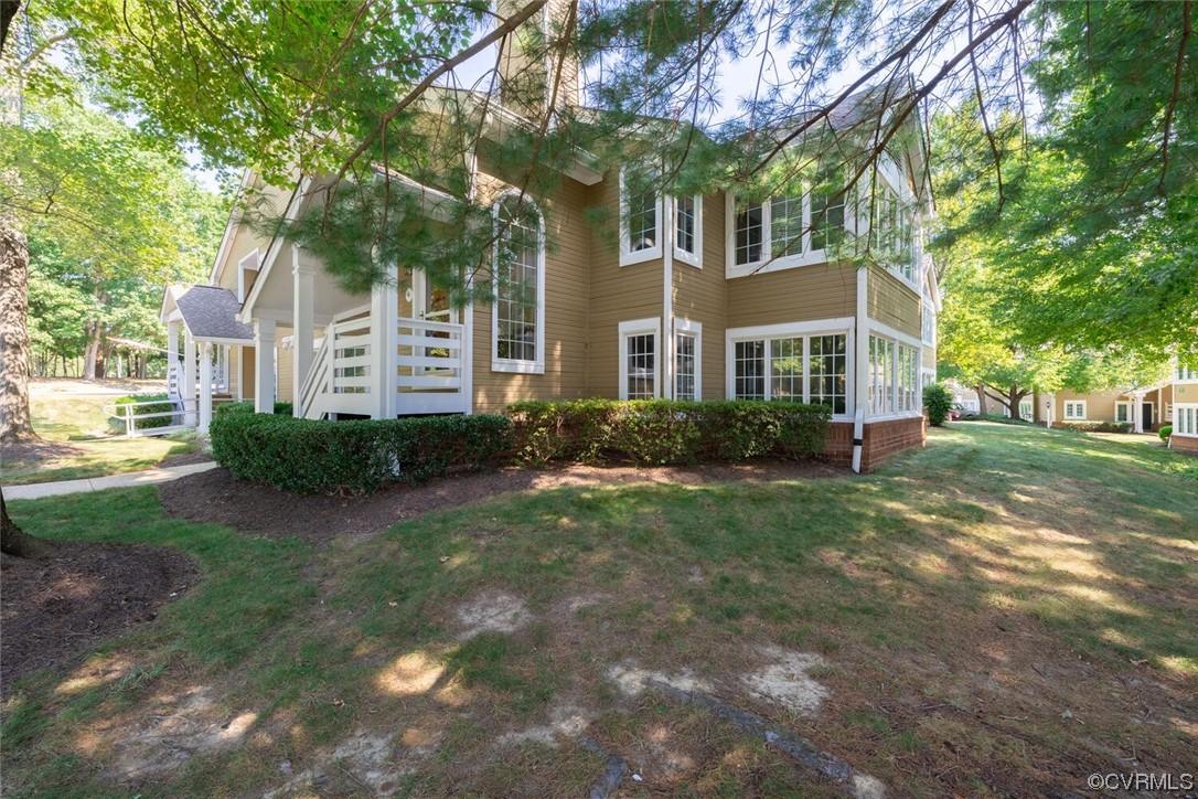 4621 Four Seasons Terrace, Unit G Glen Allen, VA 23060 - Photo 1 of 45 a front view of a house with garden