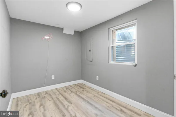 wooden floor and window in a room