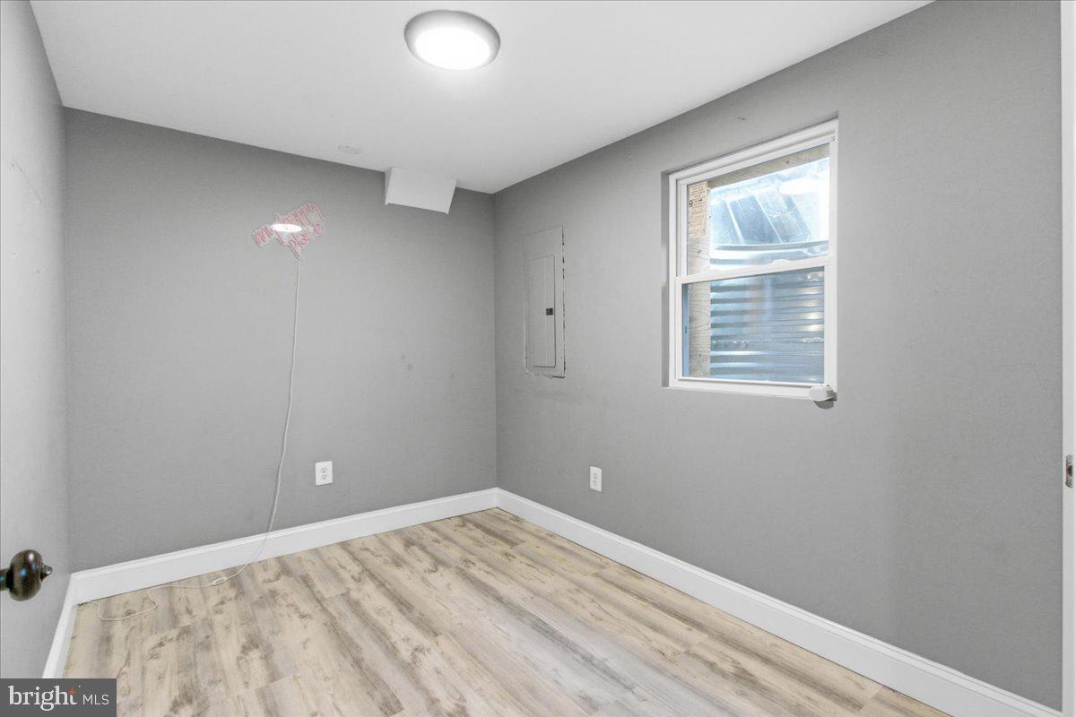 206 36th Street Southeast Washington, DC 20019 - Photo 21 of 28 wooden floor and window in a room