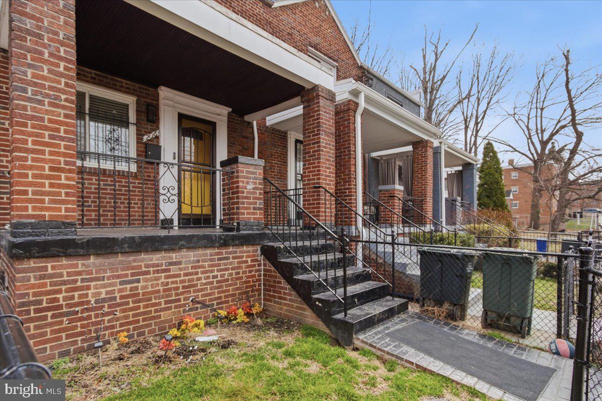 206 36th Street Southeast Washington, DC 20019 - Photo 4 of 28 a view of a house with a patio