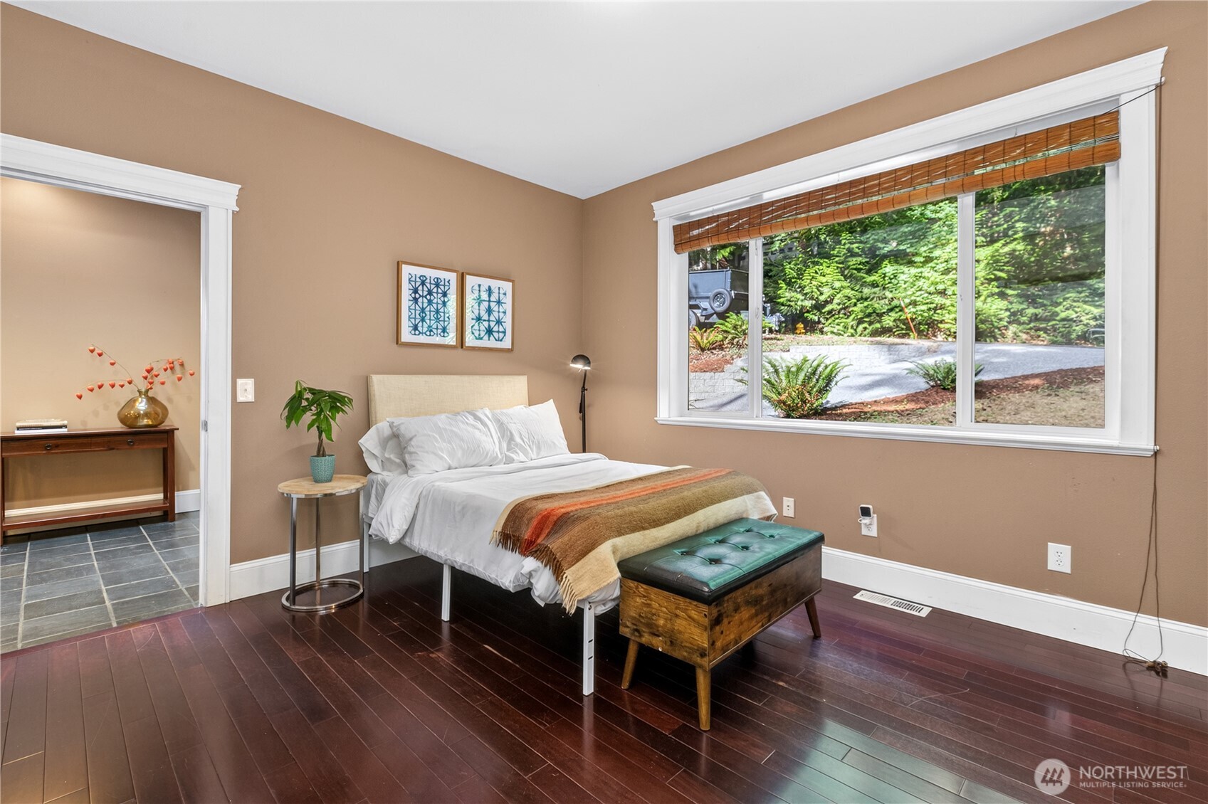 45 Cascade Lane Bellingham, WA 98229 - Photo 16 of 40 a bedroom with a bed and wooden floor